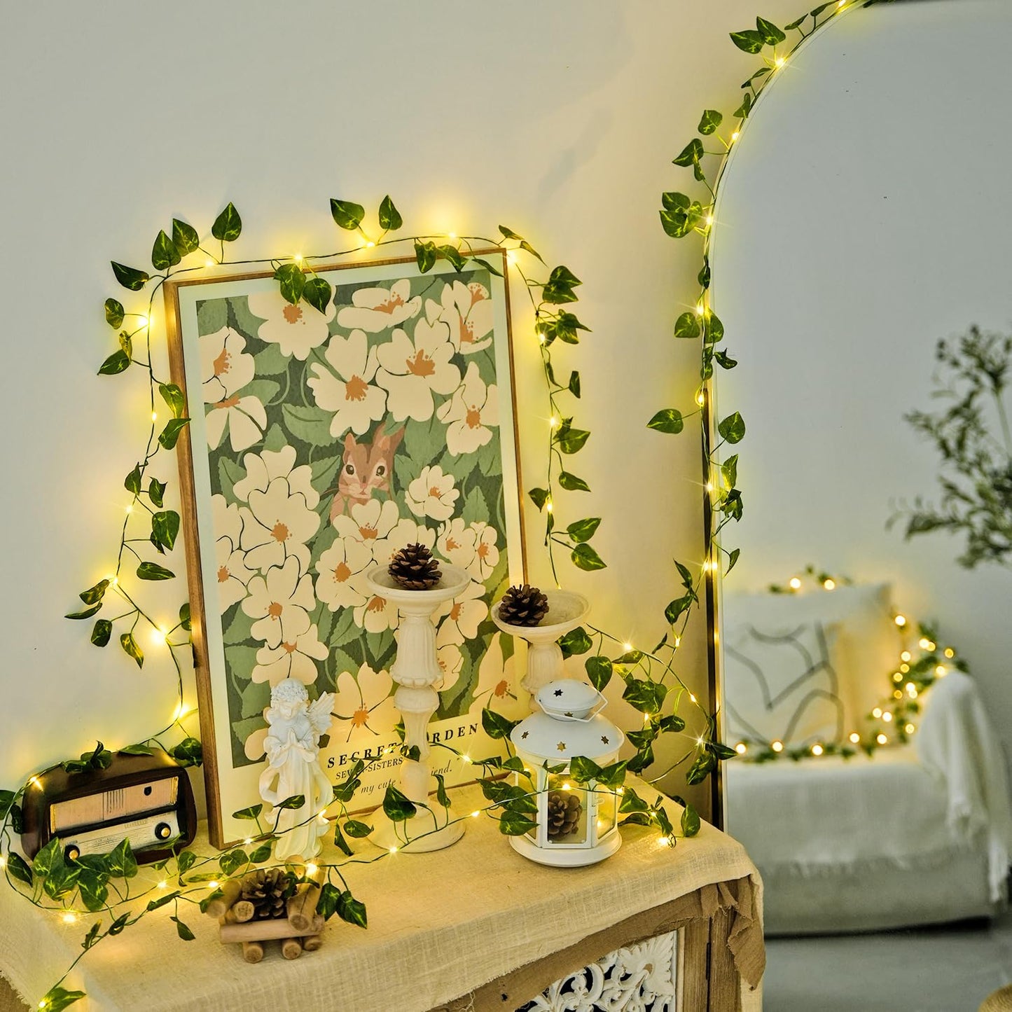 JMEXSUSS 33Ft Vines with Lights Battery Operated, 100 LED Pothos Leaf Vine Lights for Bedroom Wall Room Party Wedding Decoration (Warm White)